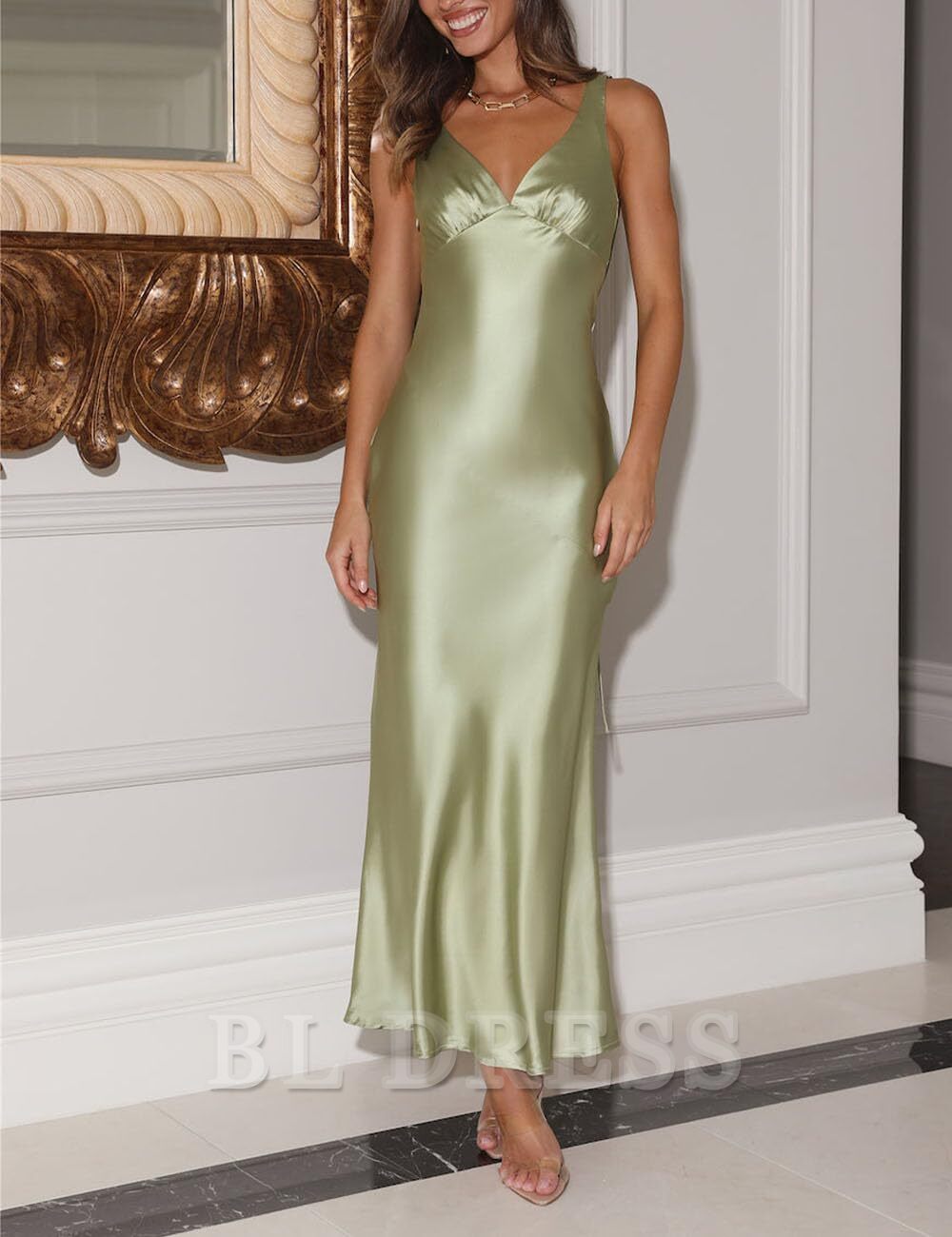 Side view of a woman wearing the elegant satin A-line dress.