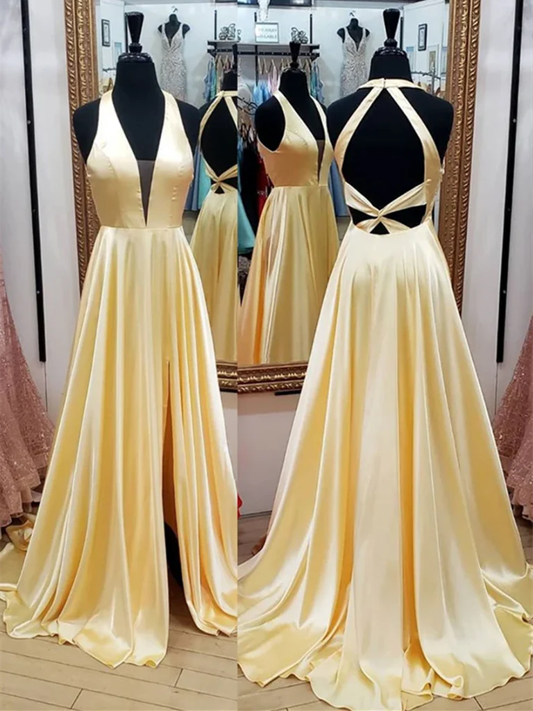 Woman wearing an elegant V-neck backless satin long dress.