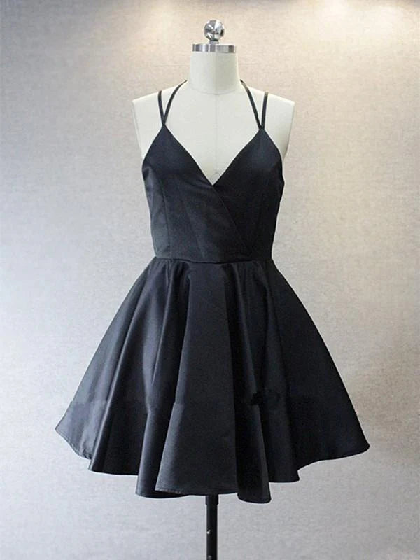 Woman wearing an elegant A-line V-neck backless short prom dress.