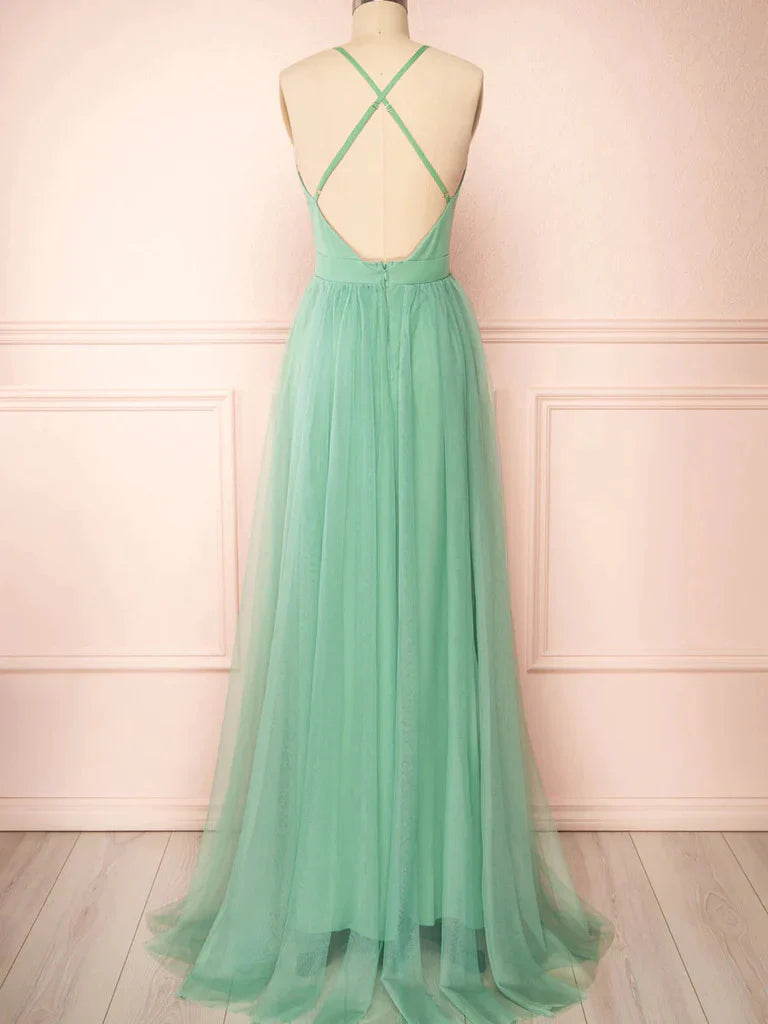 Close-up of the V-neckline and delicate tulle fabric of the prom dress.