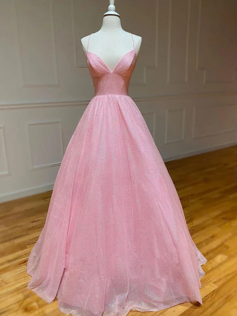 Model wearing an elegant A-line V-neck backless tulle long prom dress.