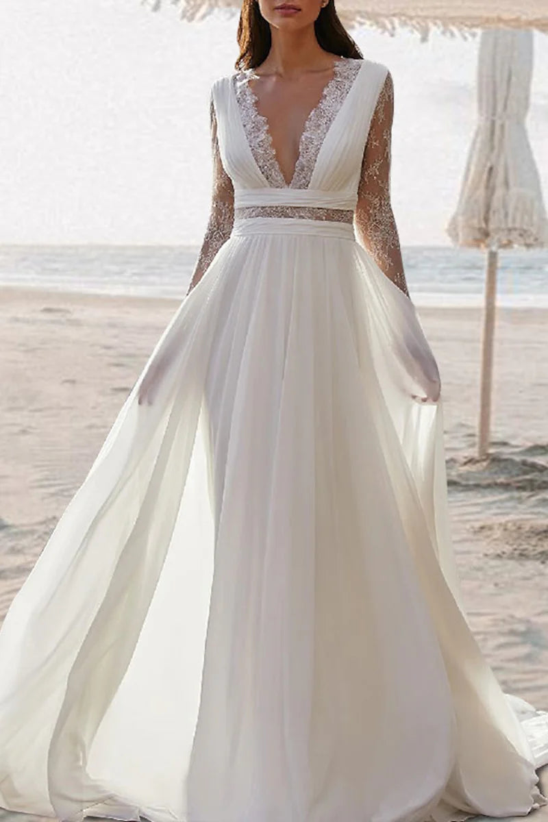 Elegant A-line V-neck beach boho wedding dress with long sleeves.