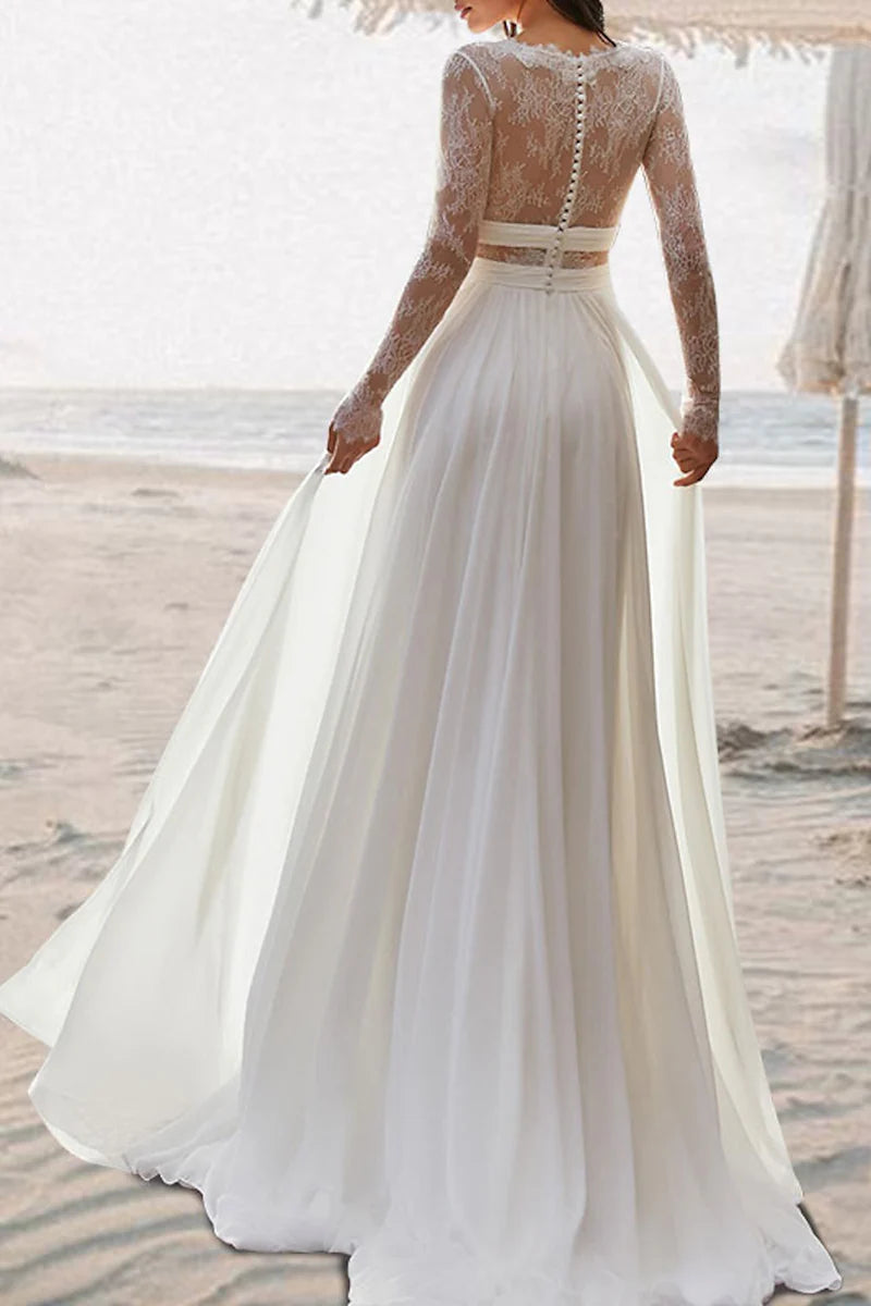 Back view of an A-line V-neck beach boho wedding dress with long sleeves.