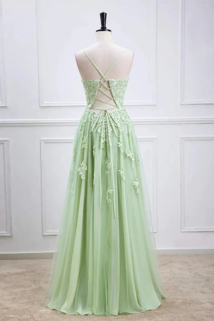 Woman wearing a graceful A-line V-neck beaded lace gown, side view.