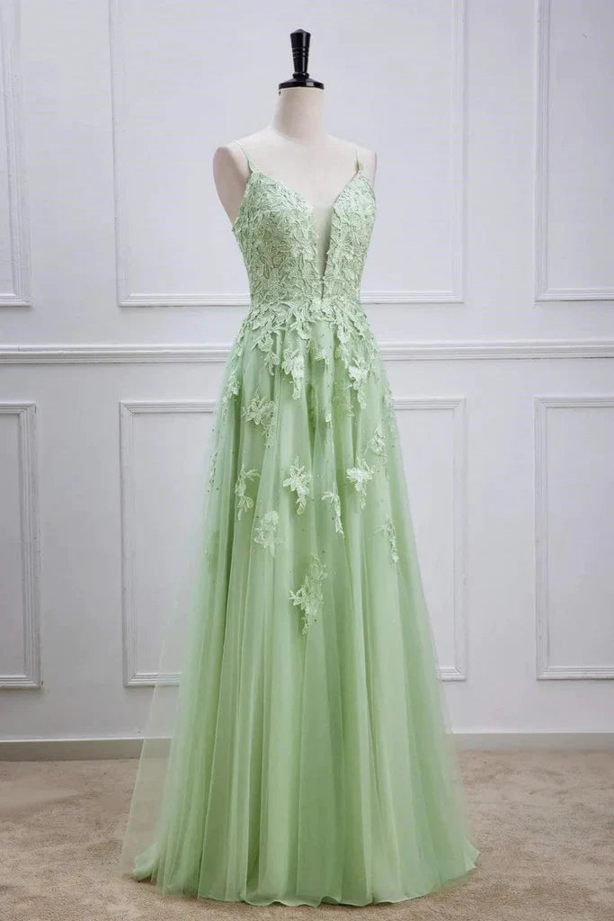 Close-up of the delicate lace and bead embellishments on the V-neck prom dress.