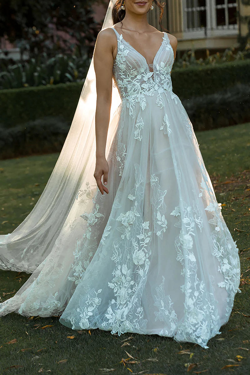 Side profile of a bride wearing the A-line boho wedding dress.
