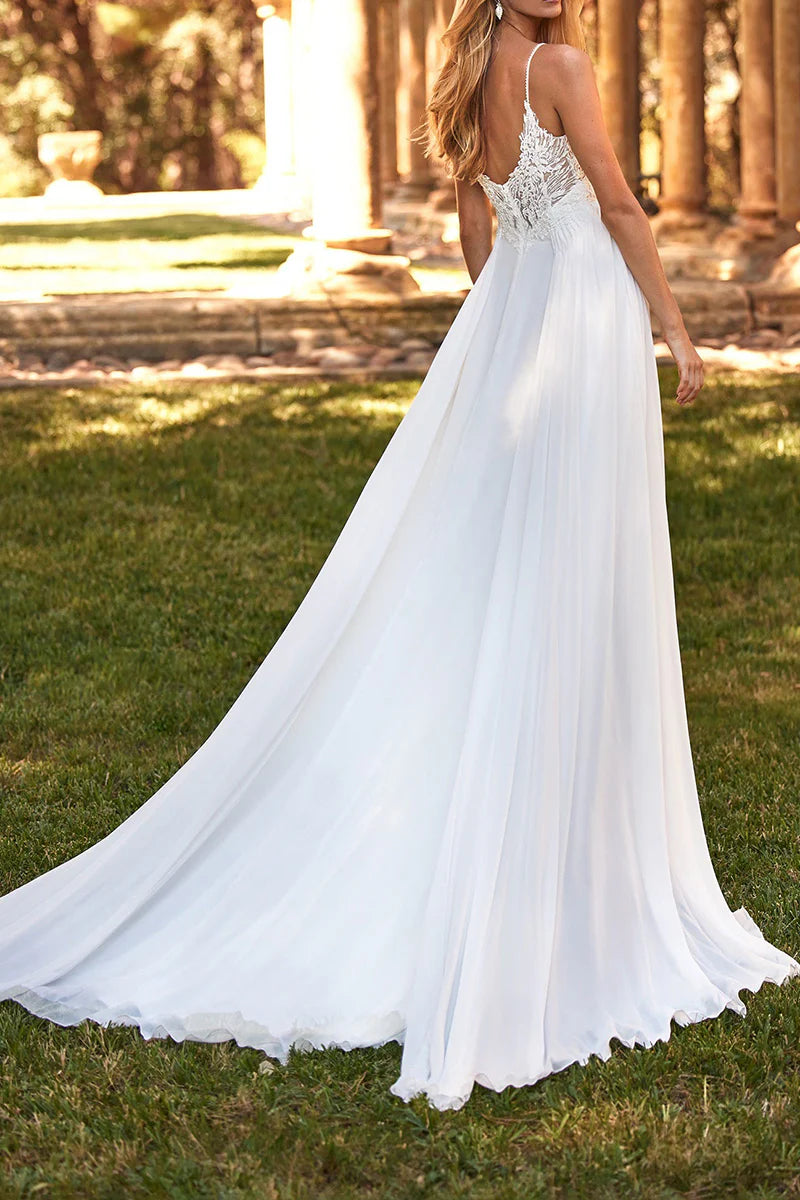 Side view of the elegant A-line wedding dress, showing lace details.