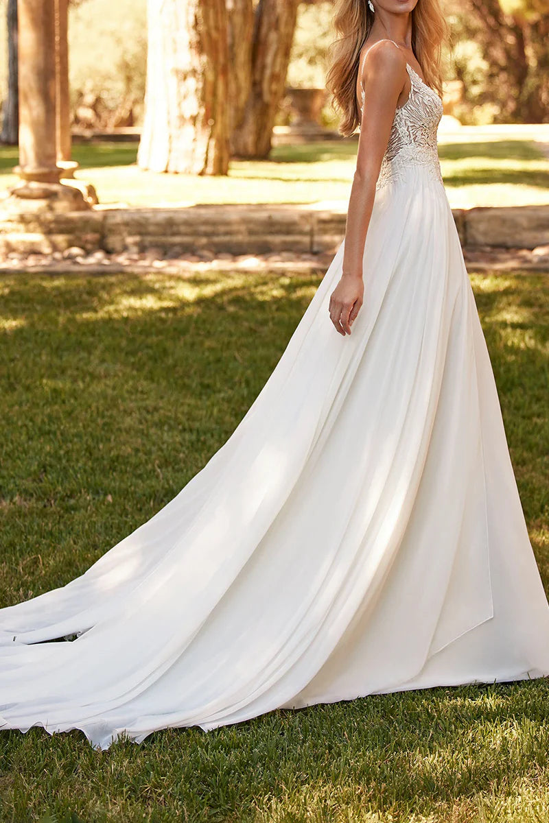 Close-up of the dress slit and ankle-length hemline.