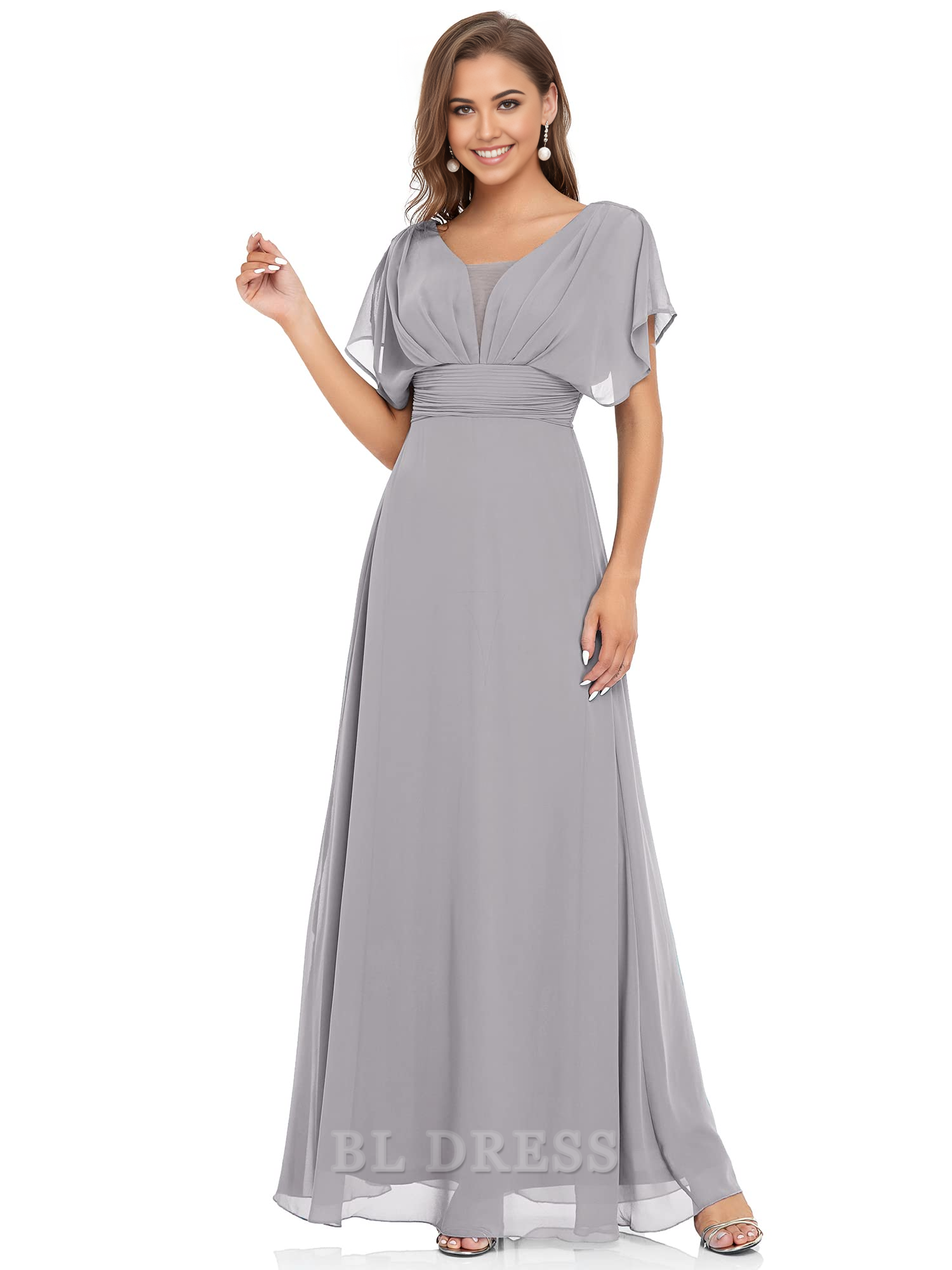 Close-up of the V-neckline and delicate chiffon fabric on the formal dress.