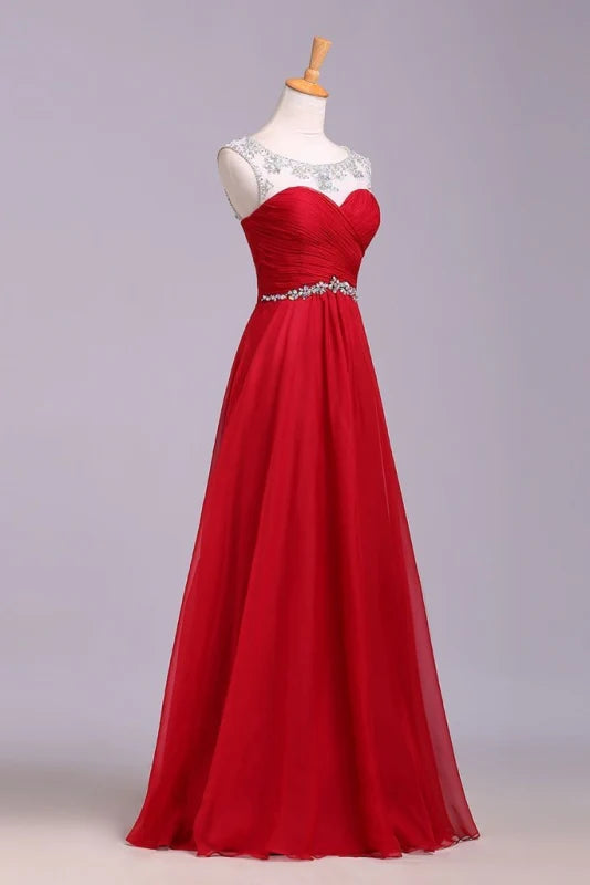 Close-up of crystal details on the bodice of a chiffon A-line dress.