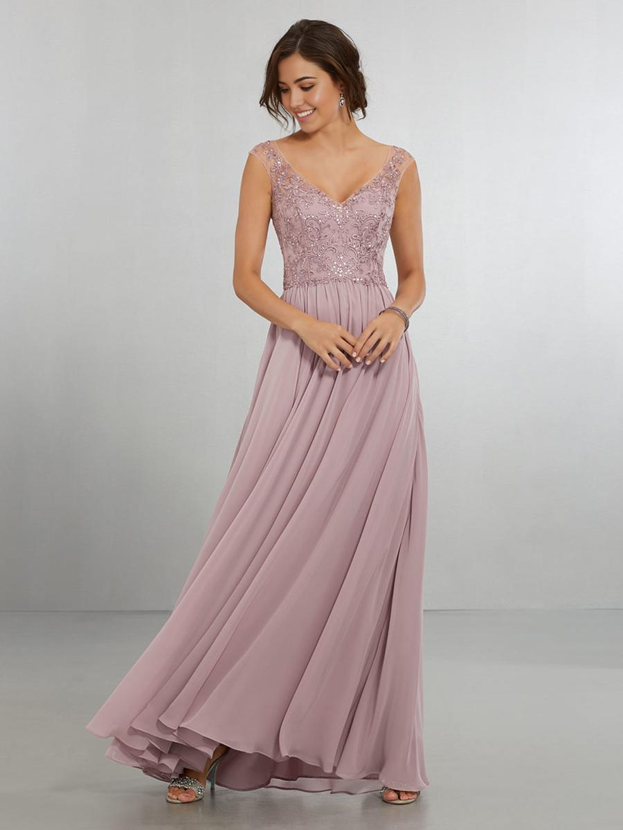 Woman wearing an elegant A-line V-neck chiffon floor-length dress.
