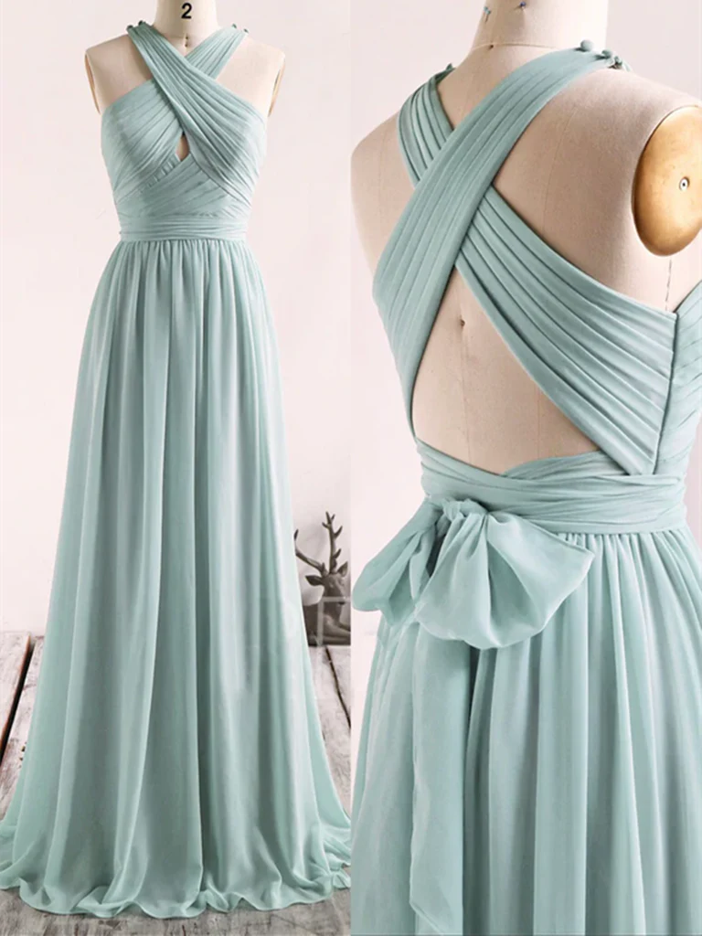 Woman wearing an elegant A-line V-neck long chiffon prom dress.