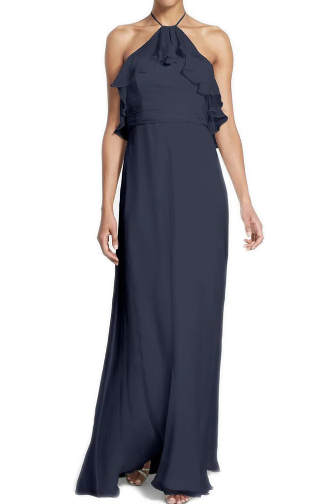 Woman wearing an elegant A-line chiffon maxi gown with a V-neckline.