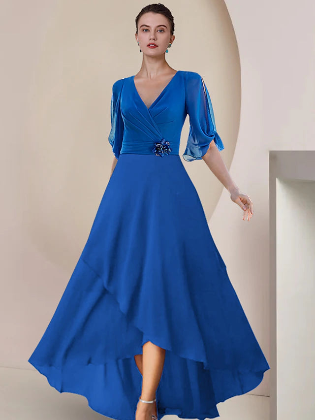 Elegant A-Line chiffon dress with V-neck and half sleeves, featuring a crystal brooch and ruching.