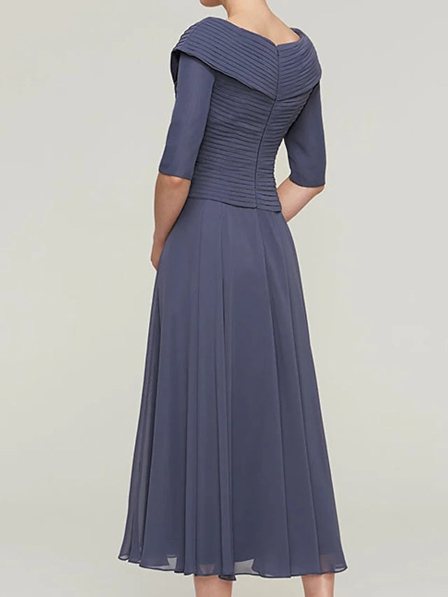 Side view of the elegant A-Line plus size dress, highlighting the pleated ankle-length skirt.