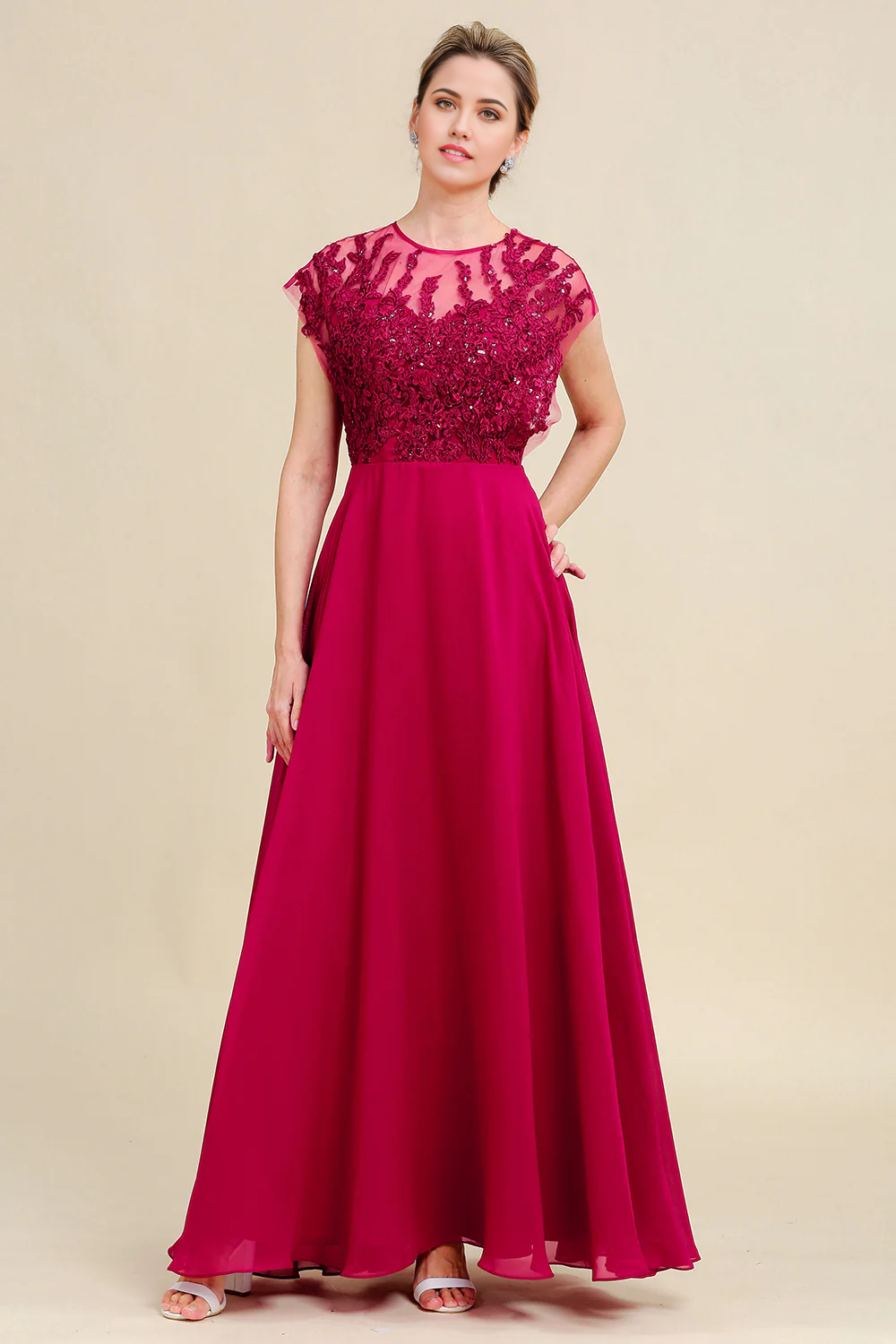 Elegant A-line chiffon mother of the bride dress with lace details and V-neck.