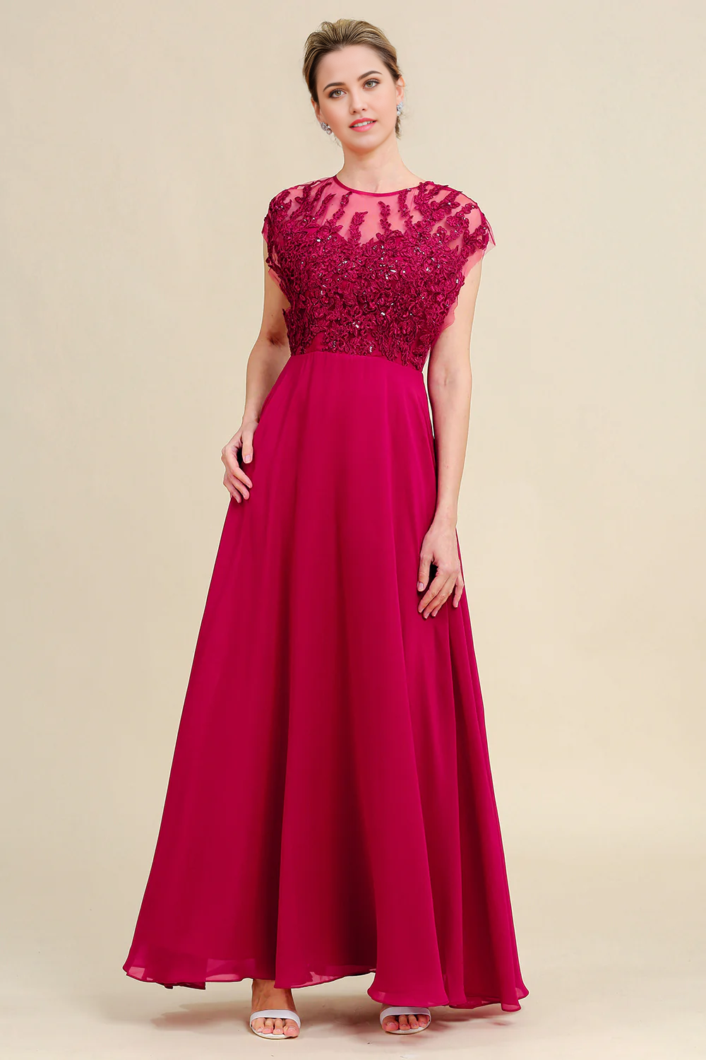 Side profile of a woman in an A-line chiffon dress, highlighting the silhouette.