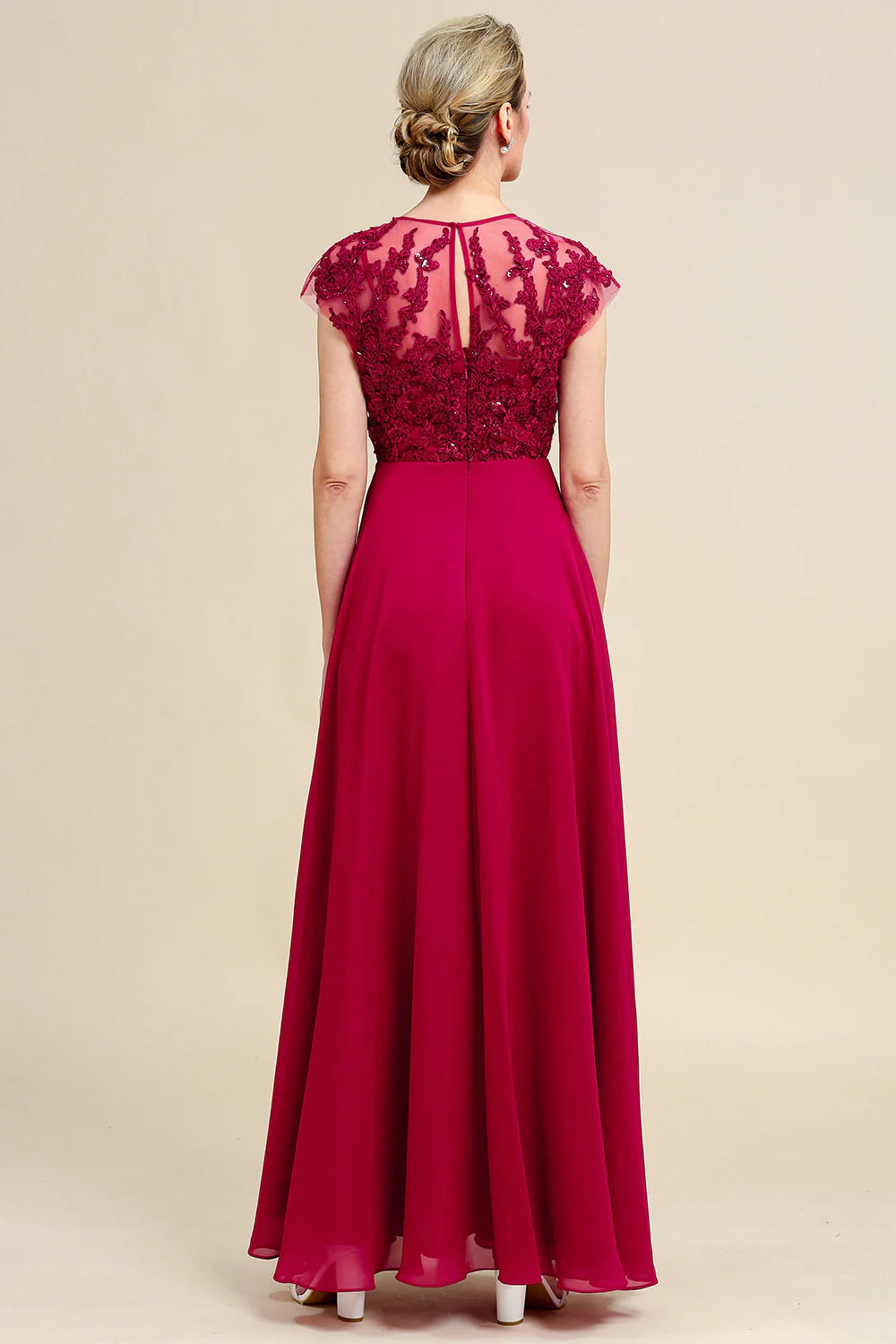 Burgundy A-line chiffon mother of the bride dress with lace, worn by a woman.
