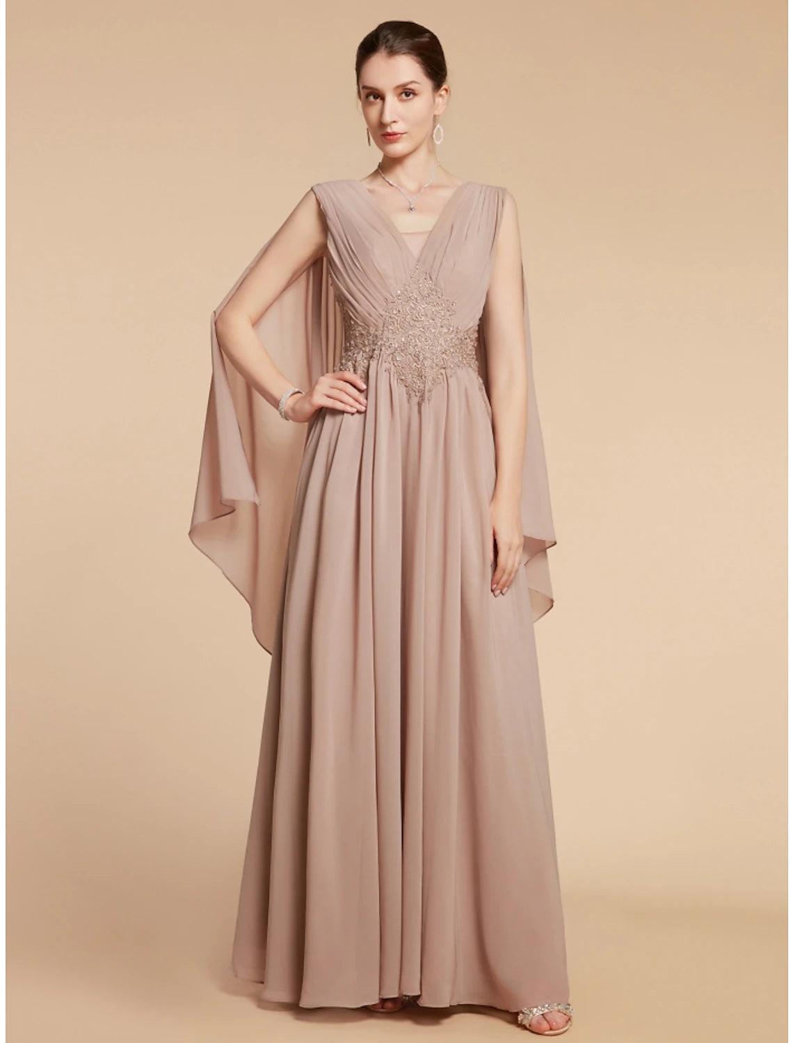 Side profile of sleeveless A-Line gown, showing ruching detail.