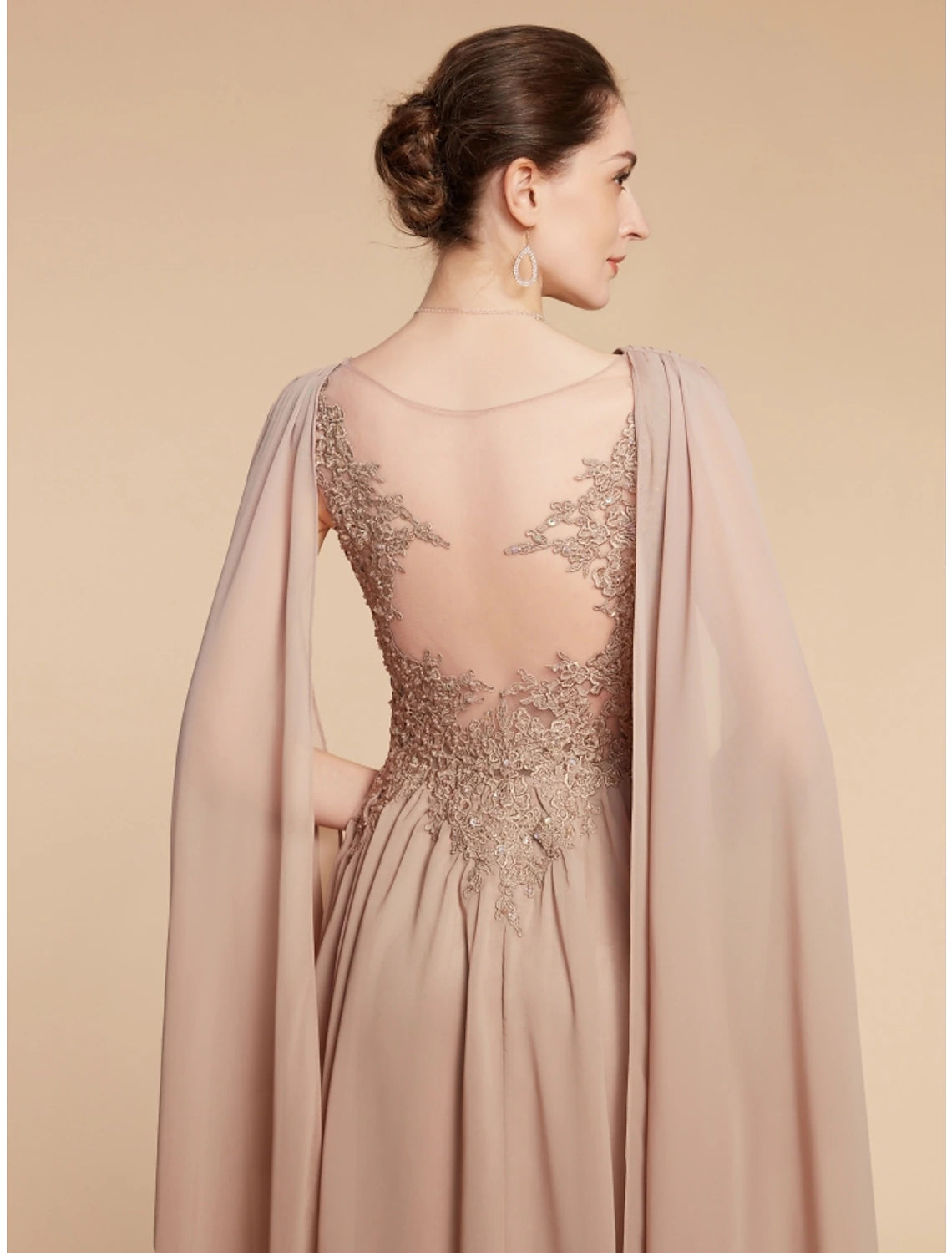 Close-up of V-neckline and lace bodice on formal dress.