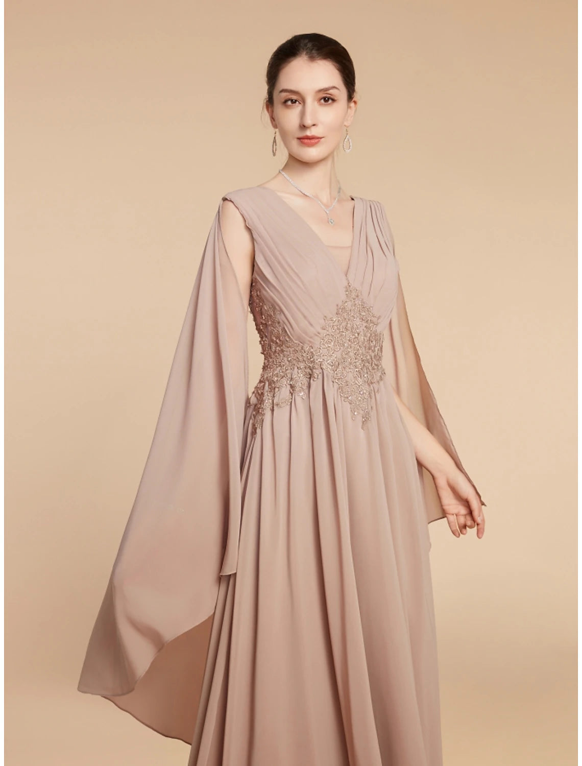 Full length view of solid color A-Line dress for wedding guests.