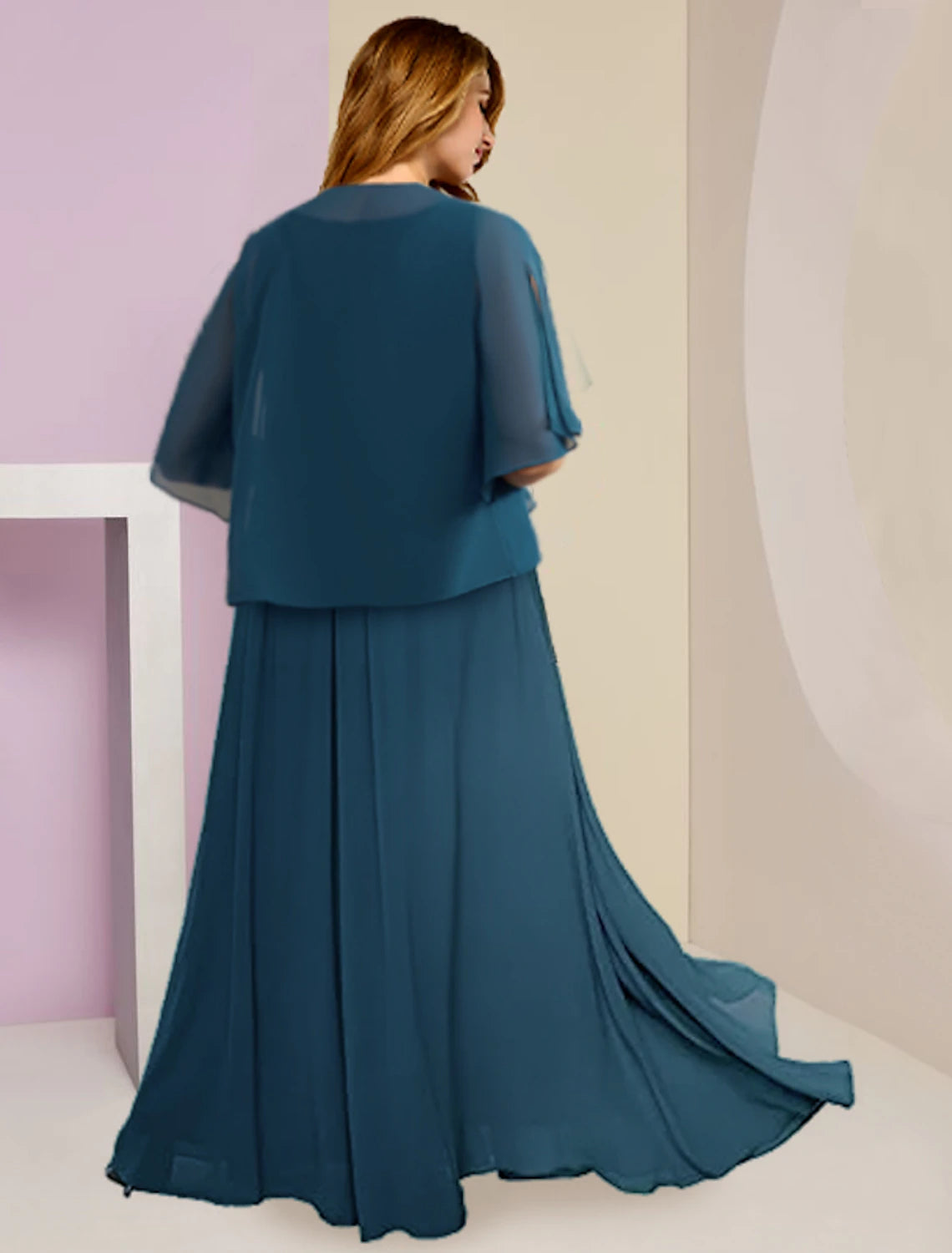 Full length view of elegant two-piece A-line V-neck chiffon lace gown.
