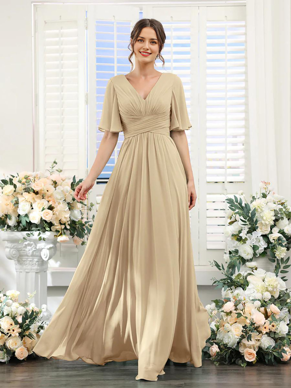 Champagne A-line V-neck chiffon long sleeve formal dress.