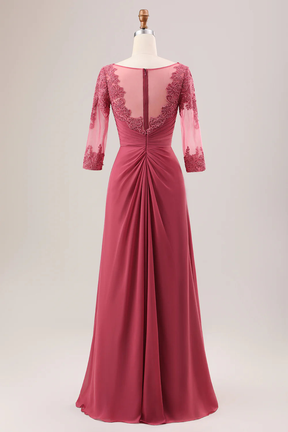 Side profile of a model wearing the terracotta A-line chiffon dress, showing its flowing skirt.