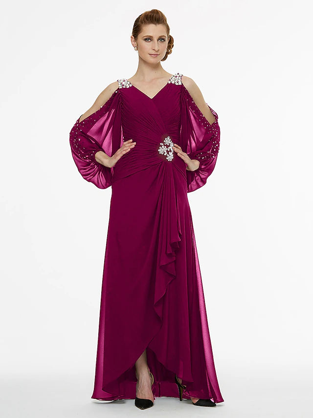 Side view of elegant Mother of the Bride gown with pleats and beading.