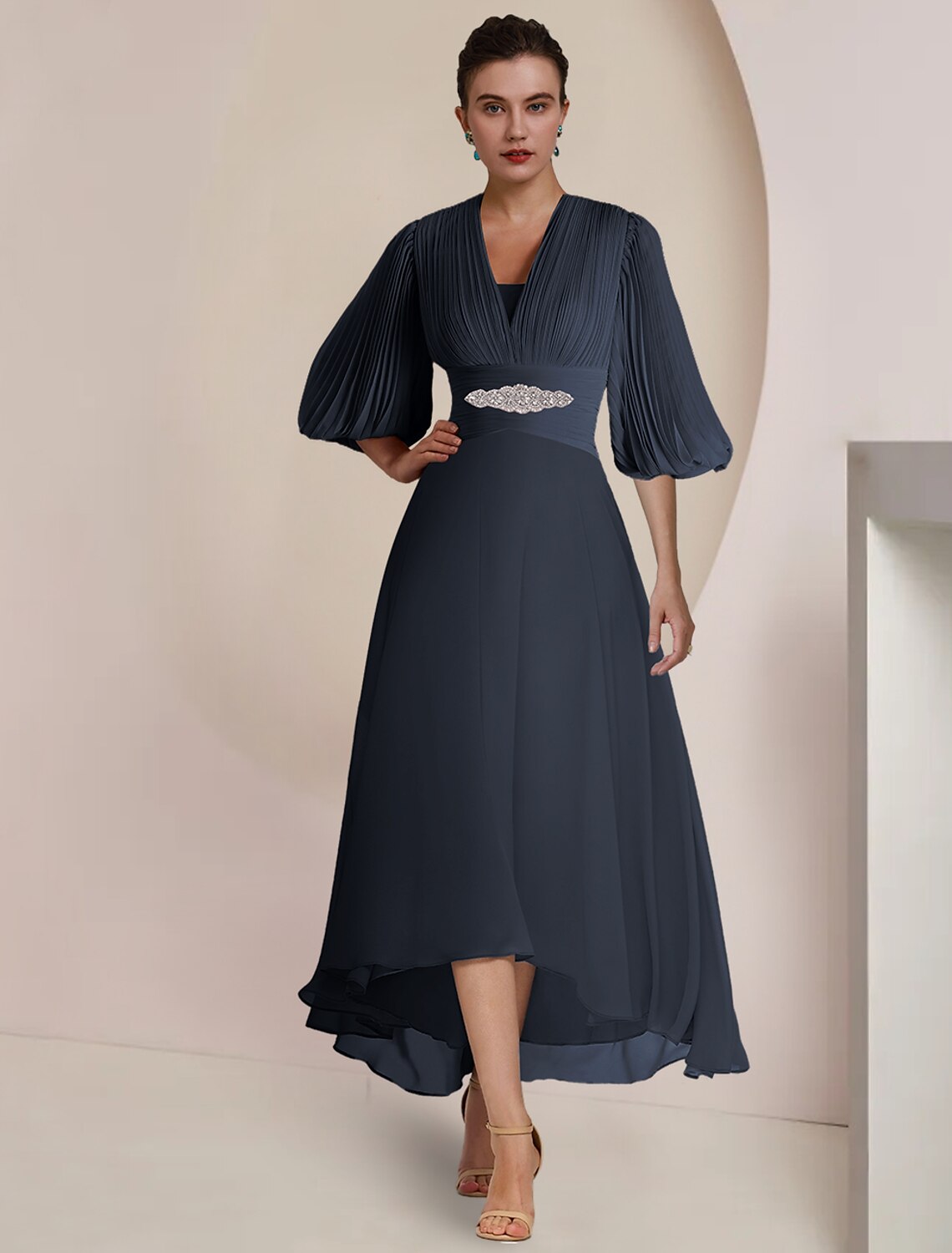 Elegant A-Line V-neck chiffon dress with 3/4 sleeves and pleats.