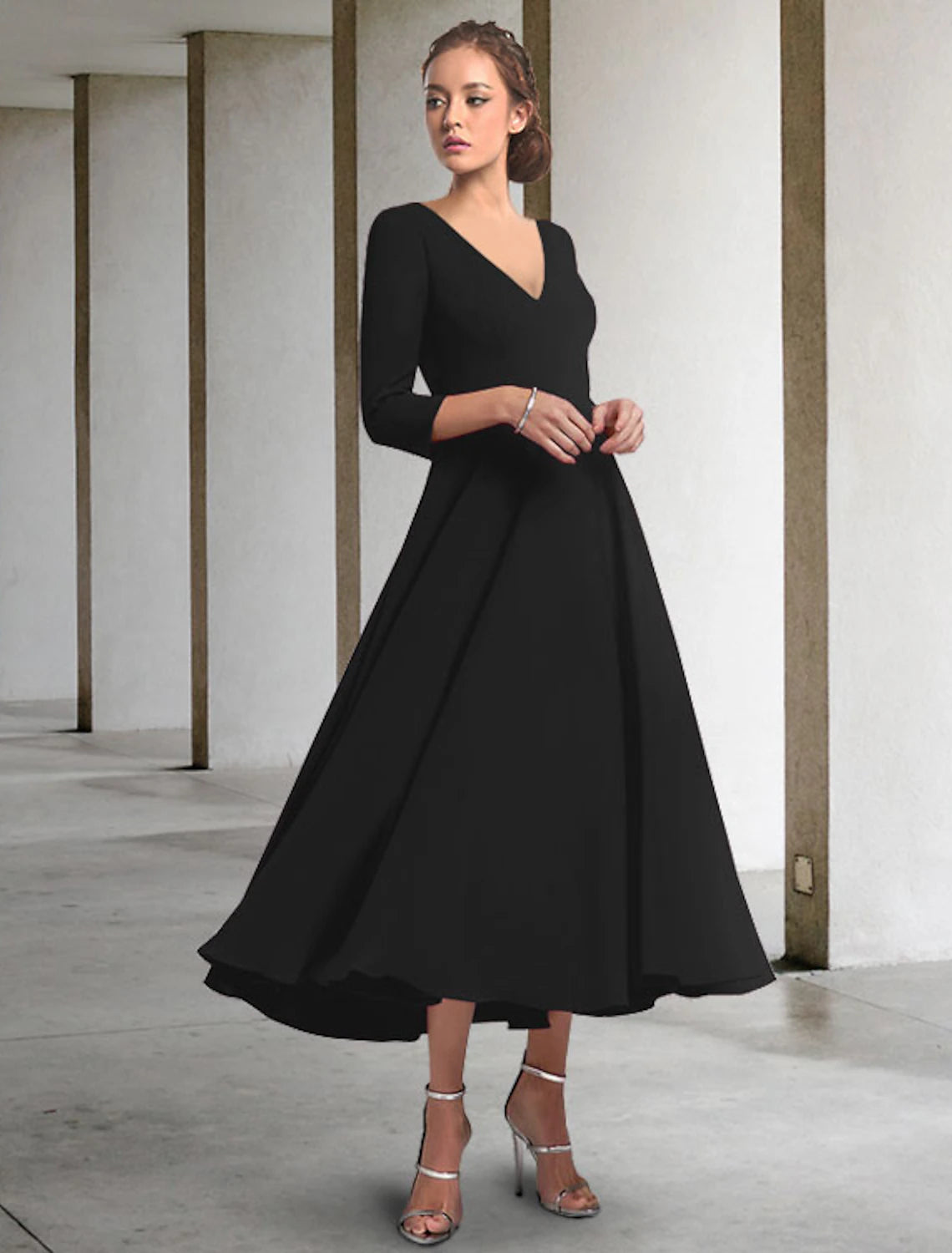 Elegant A-Line Mother of the Bride dress with V-neck and 3/4 sleeves.