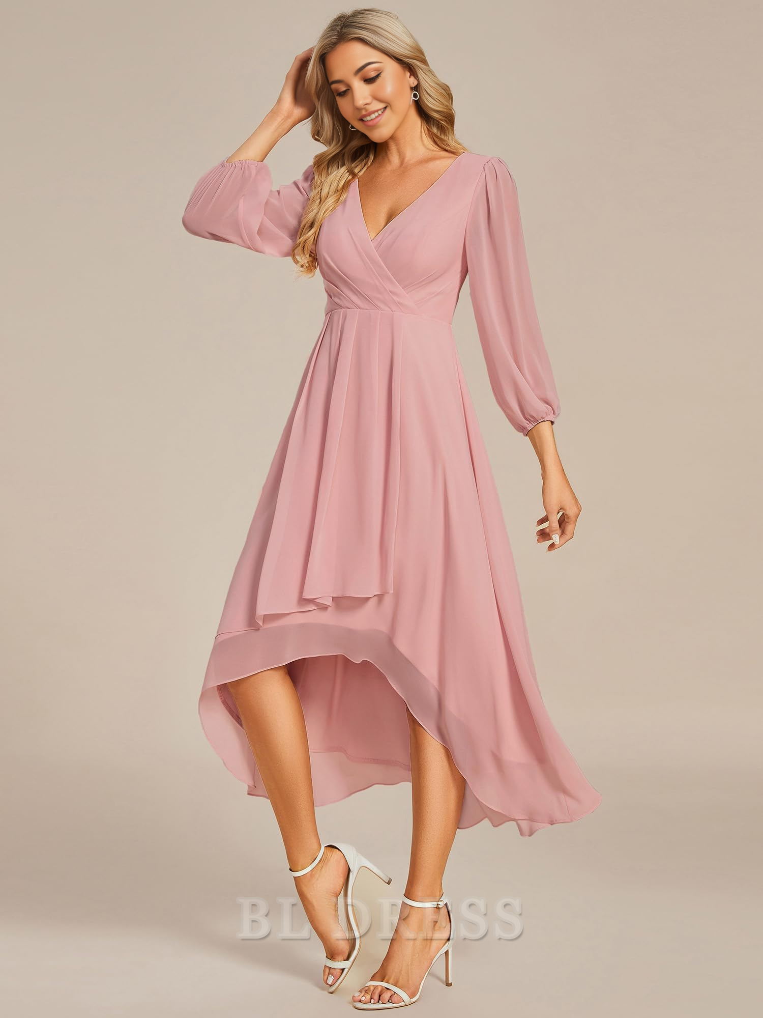 Close-up of pleated detail on chiffon midi dress.