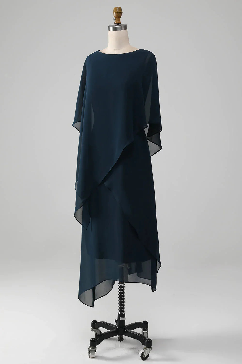 Flowy chiffon Mother of the Bride gown in navy, back view.