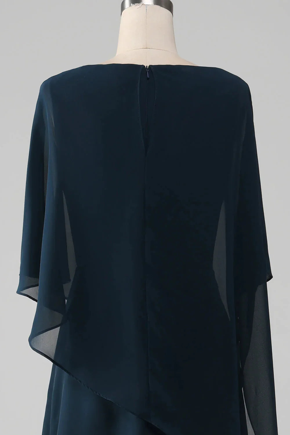 Sophisticated navy A-line dress with V-neckline, full length.
