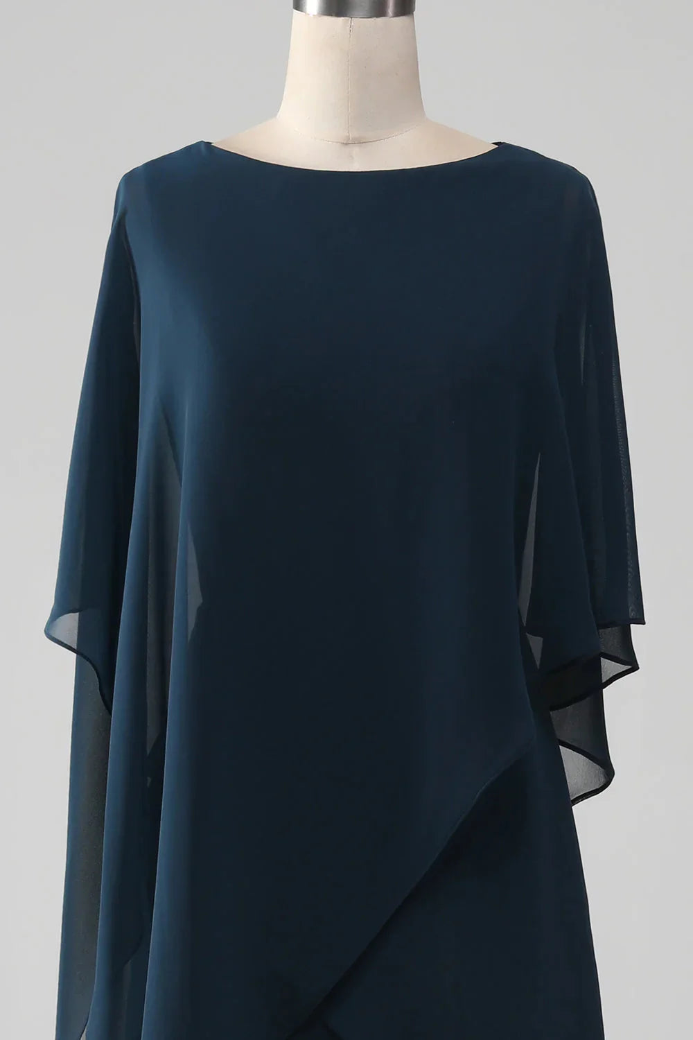 Chiffon V-neck formal dress in navy, detailed view.