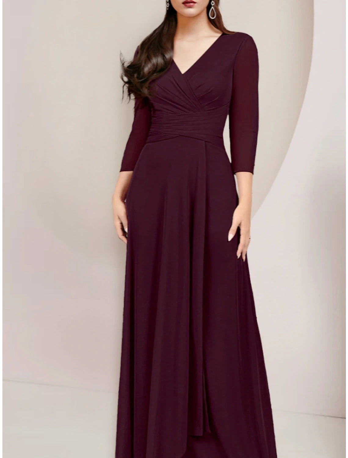 Back view of the floor-length A-Line Mother of the Bride dress with ruched details.