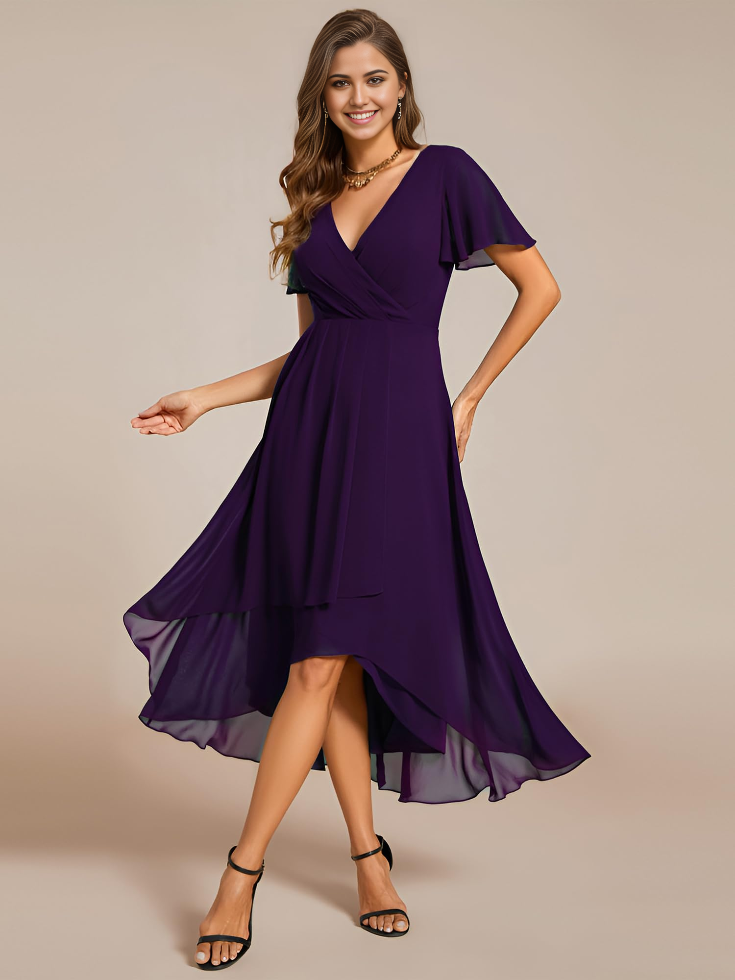 Model wearing an A-line V-neck chiffon dress with ruffle sleeves and a high-low hem.