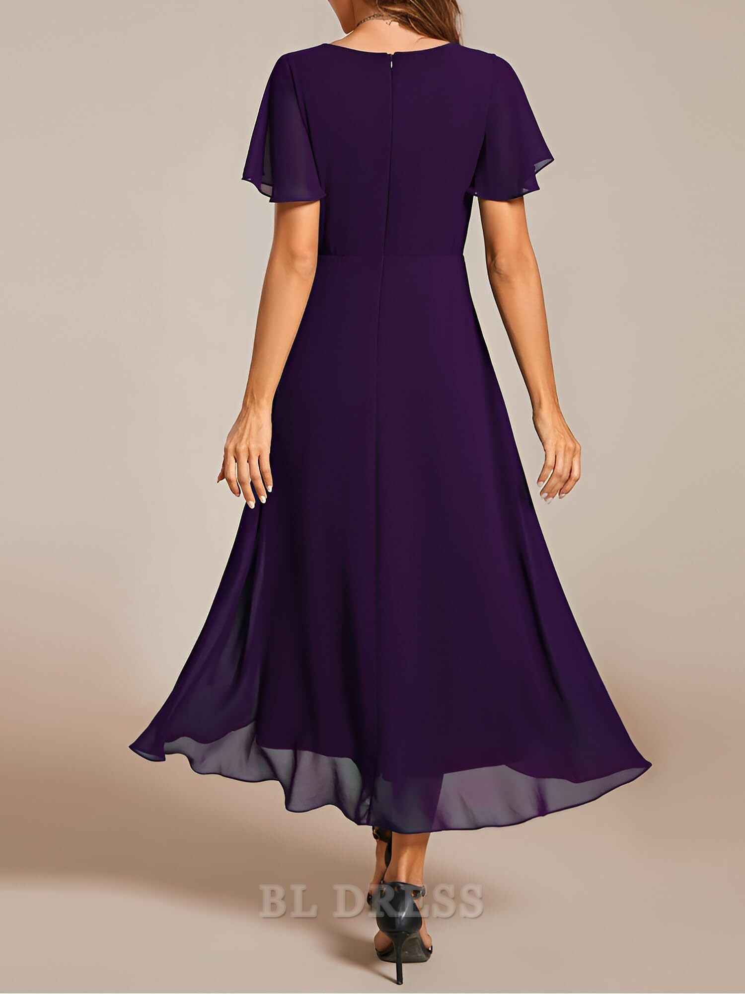 Side view of the A-line V-neck chiffon dress, highlighting ruffle sleeves and pleated details.