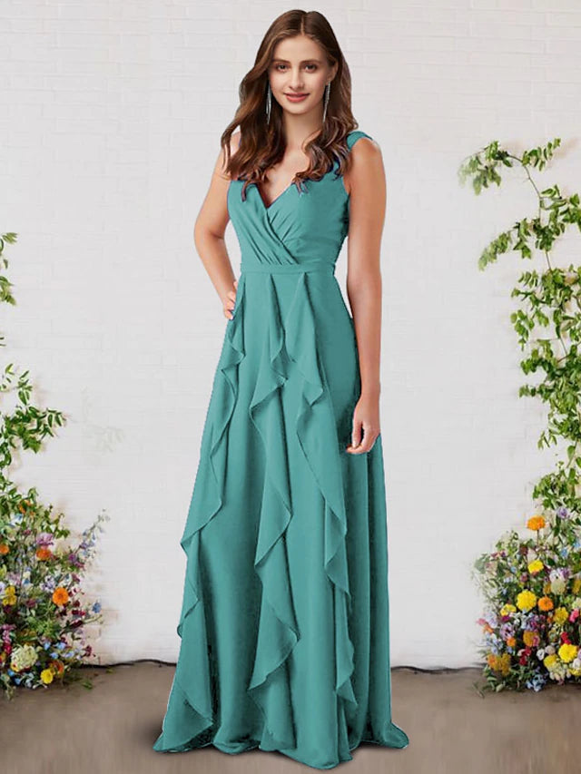 Side profile of the sleeveless A-line chiffon gown, highlighting the ruffles.
