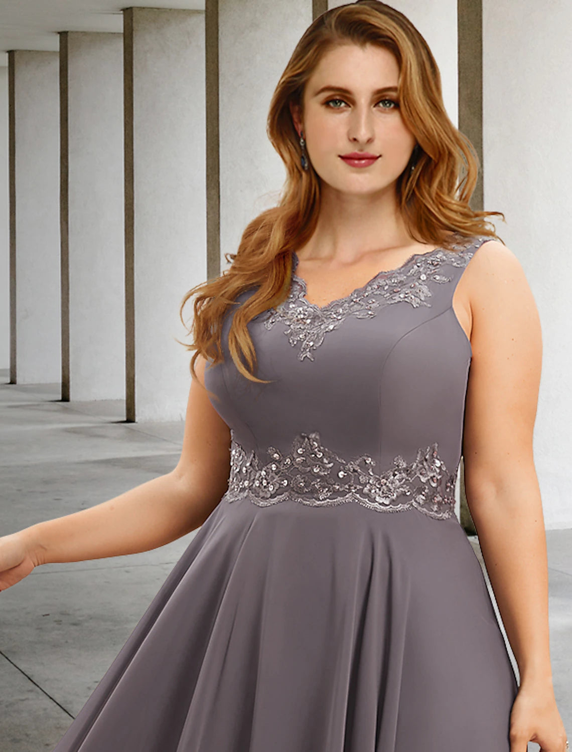 Back view of the elegant two-piece formal dress, highlighting the flow of the A-line skirt.
