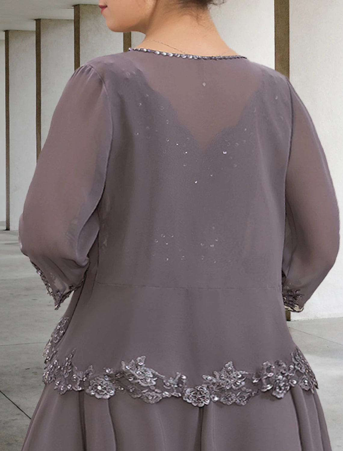 Another angle of the two-piece chiffon dress, emphasizing its elegant silhouette.