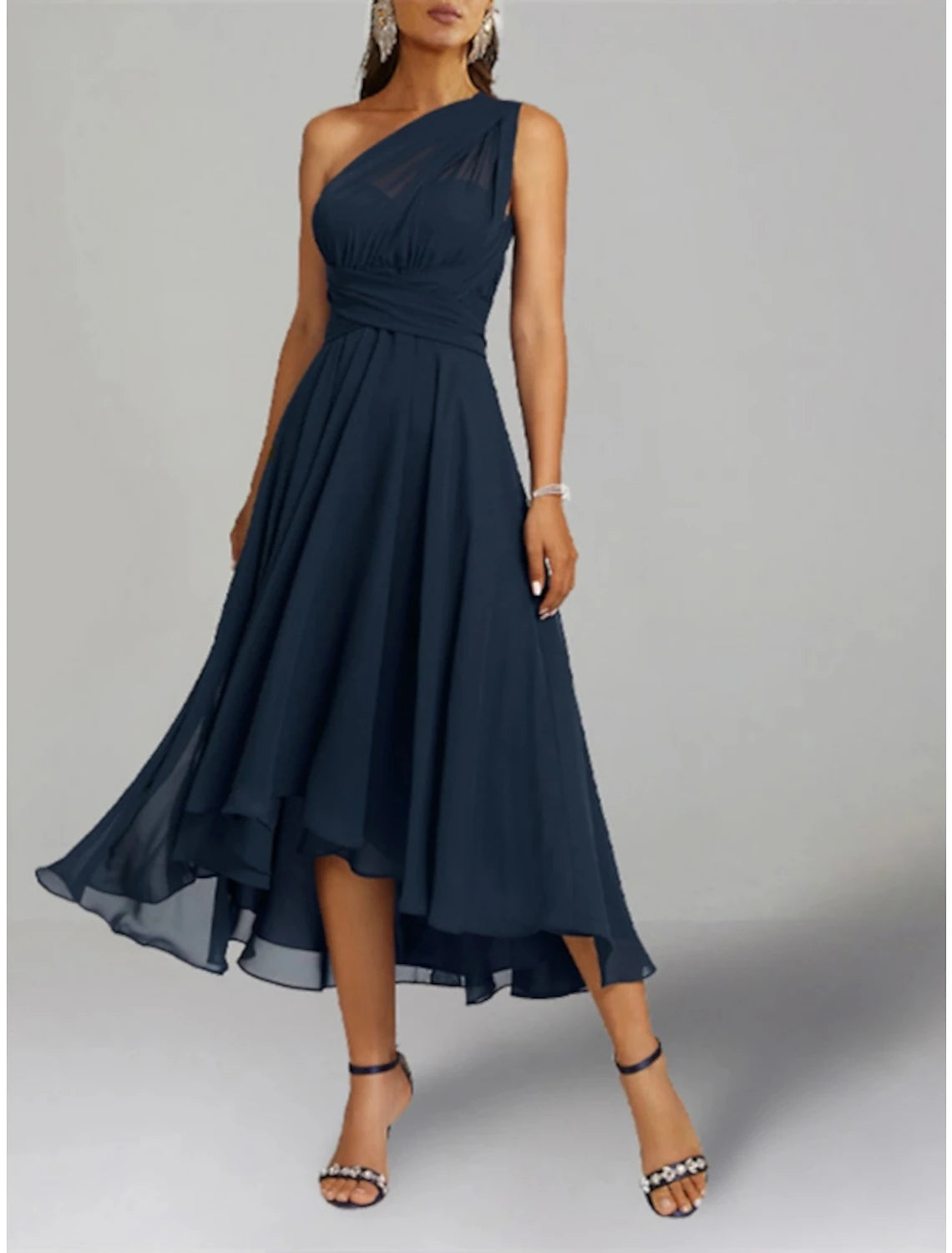 Side view of the elegant chiffon dress, emphasizing the A-line skirt and shawl drape.