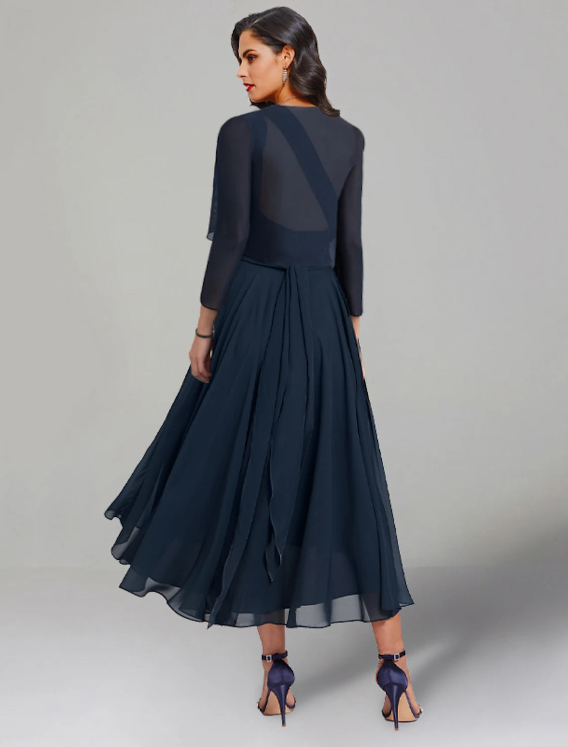 Full view of the two-piece tea-length dress, ideal for wedding guests or cocktail parties.