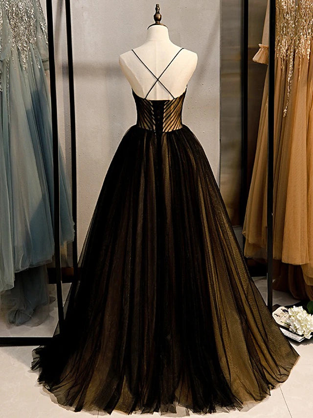 Side view of the elegant A-Line evening gown with flowing tulle skirt.