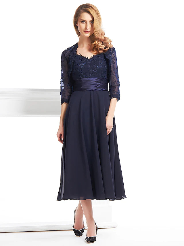 Elegant A-Line V-neck Mother of the Bride dress with lace appliques.