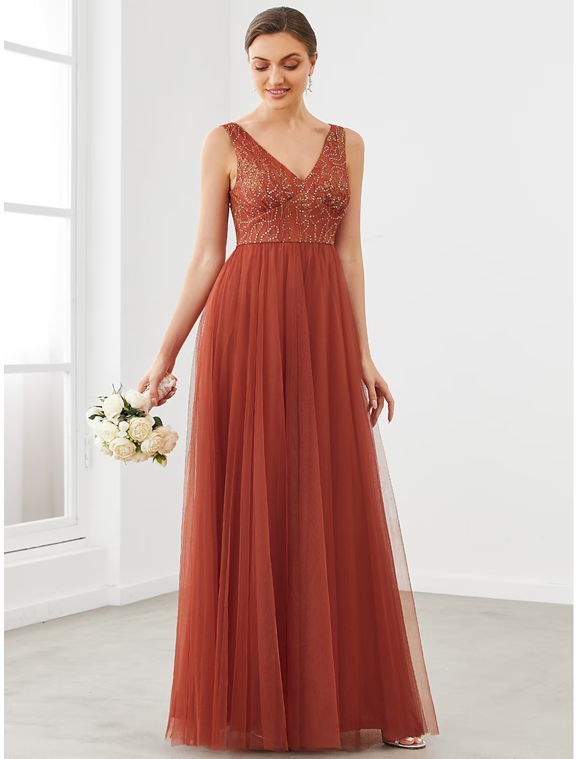 Side view of floor-length A-line V-neck homecoming dress.