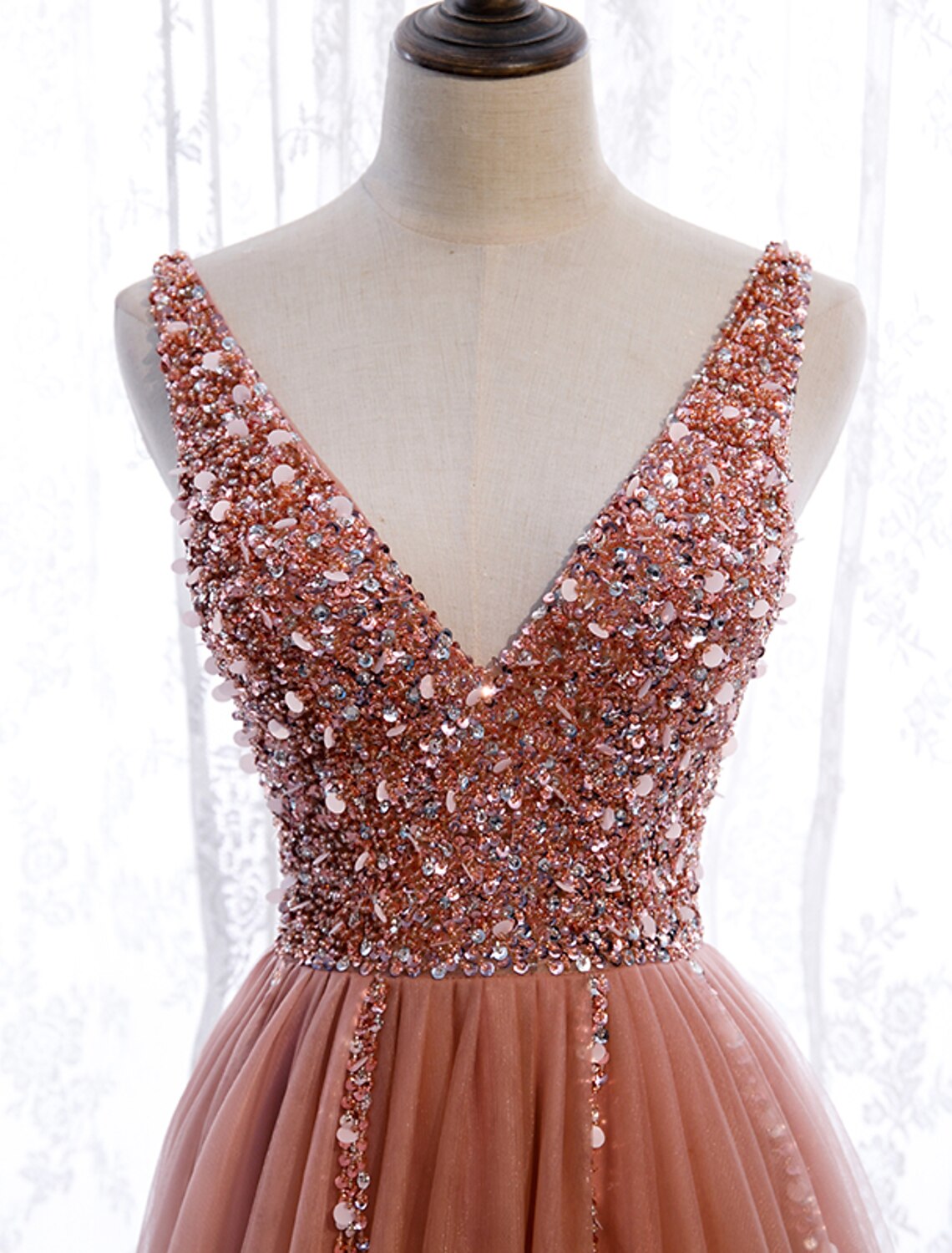 Close-up of pearls embroidery detail on the A-Line V-Neck dress.