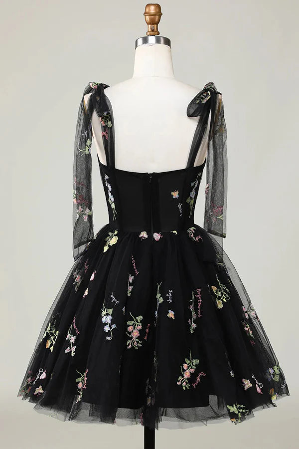 Close-up of floral embroidery on A-Line short dress.