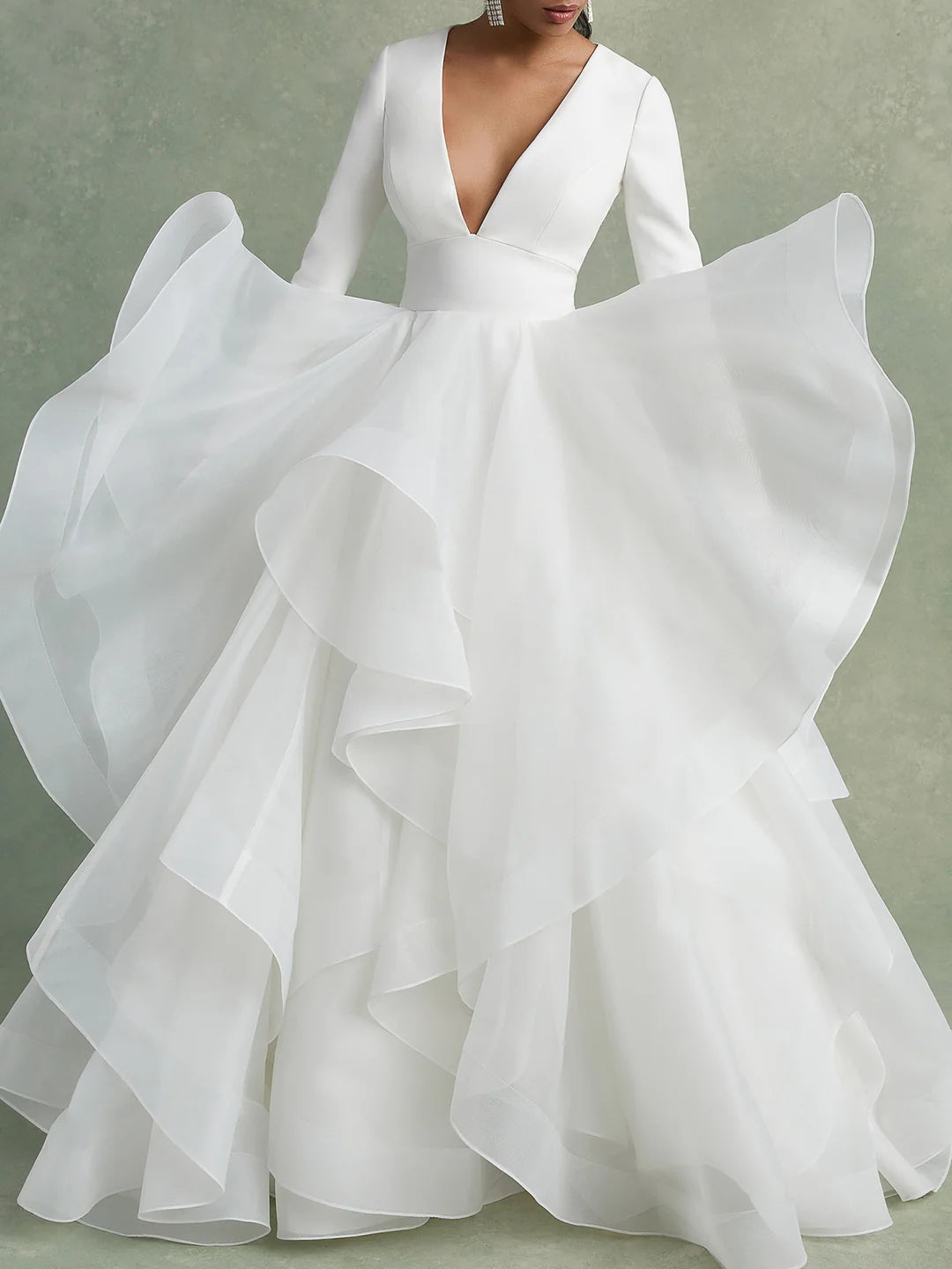 Elegant A-Line V-Neck ball gown wedding dress, front view.