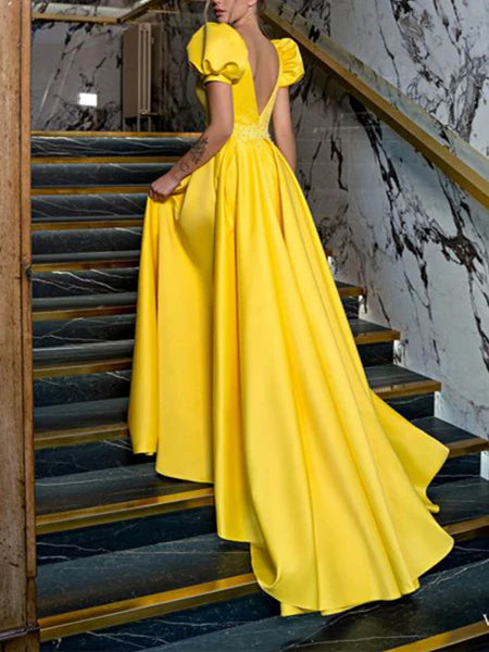 A-line V-neck formal gown with flowing skirt.